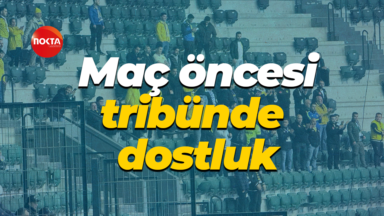Maç öncesi tribünde dostluk
