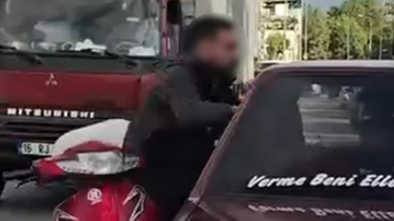 Trafik tartışmasında camdan içeri girmeye çalıştı!