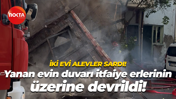 İki evi alevler sardı! Yanan evin duvarı itfaiye erlerinin üzerine devrildi!