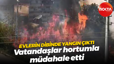Evlerin dibinde yangın çıktı... Vatandaşlar hortumla müdahale etti
