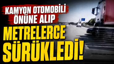 Kamyon otomobili önüne alıp metrelerce sürükledi!