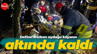 Define ararken kayanın altında sıkıştı, itfaiye kurtardı