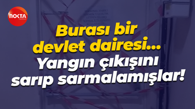 Burası bir devlet dairesi… Yangın çıkışını sarıp sarmalamışlar!