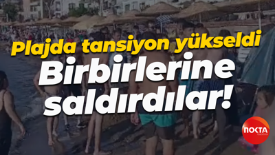 Plajda tansiyon yükseldi... Birbirlerine saldırdılar!
