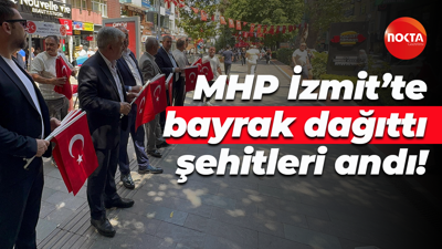 MHP İzmit’te bayrak dağıttı, şehitleri andı!