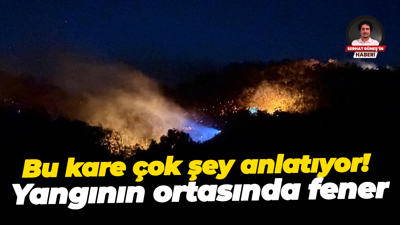 Bu kare çok şey anlatıyor! Yangının ortasında fener