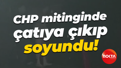 CHP mitinginde çatıya çıkıp soyundu!