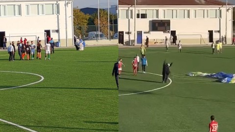 Bursa'da ilginç görüntüler! Futbol sahasına paraşütle indi