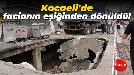 Kocaeli'de facianın eşiğinden dönüldü: Hafriyat kamyonu çöken yolda çukura düştü