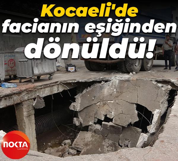 Kocaeli'de facianın eşiğinden dönüldü: Hafriyat kamyonu çöken yolda çukura düştü