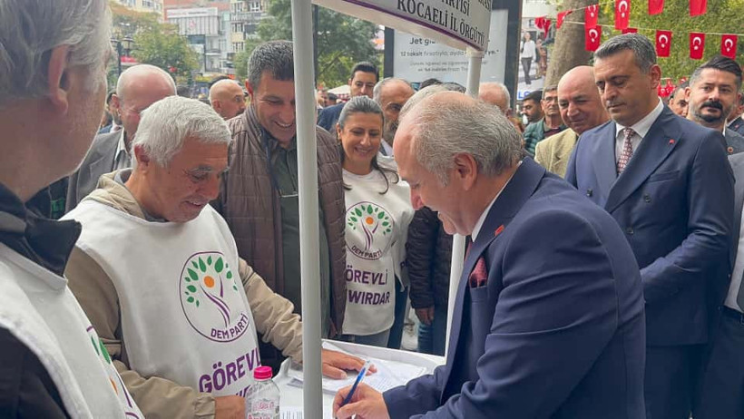 Erdem Arcan'dan DEM Parti standına imza - Resim : 1