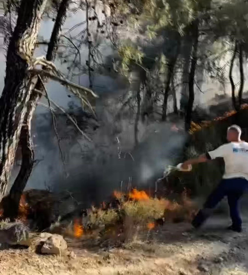 Alevlere elindeki pet şişeyle direndi! - Resim : 3