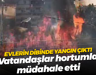 Evlerin dibinde yangın çıktı... Vatandaşlar hortumla müdahale etti